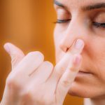 Woman doing Alternate Nostril Breathing meditation at Radiant You