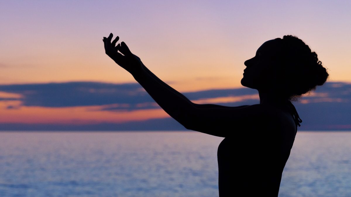 Woman getting Divine message in meditation